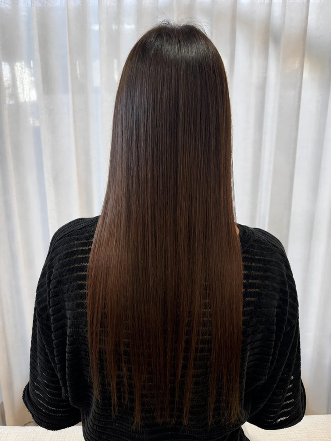 Tape extension result with long silky hair