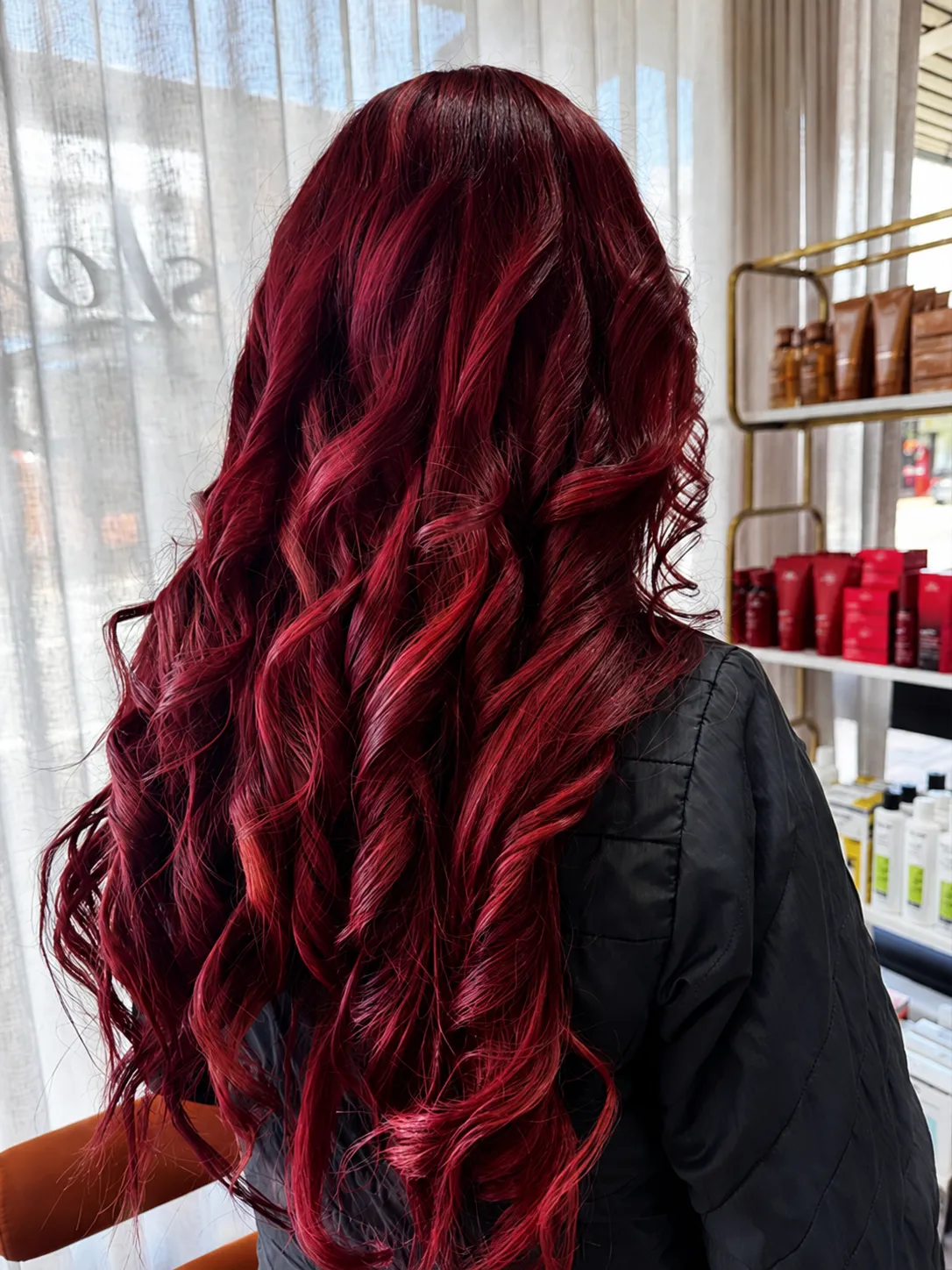 Tape hair extensions styled with soft waves at Luscious Lox Neutral Bay
